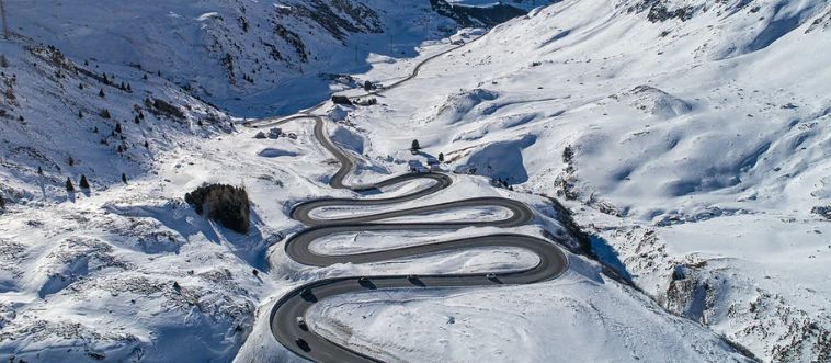Let's start with a beautiful, winding puzzle: when you're navigating those breathtaking, hairpin turns high up in Europe's Alps, which driving habit keeps you safest?